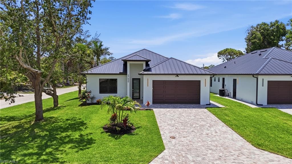 Front of home, Corner lot with Mango Tree