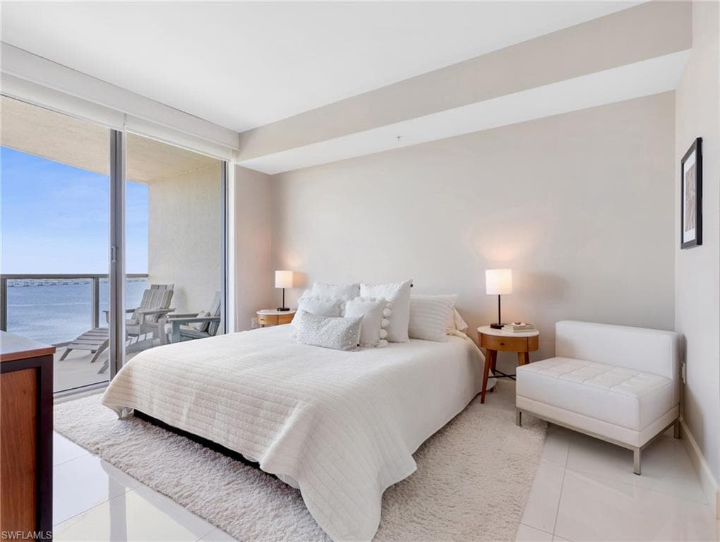 bedroom with floor to ceiling windows