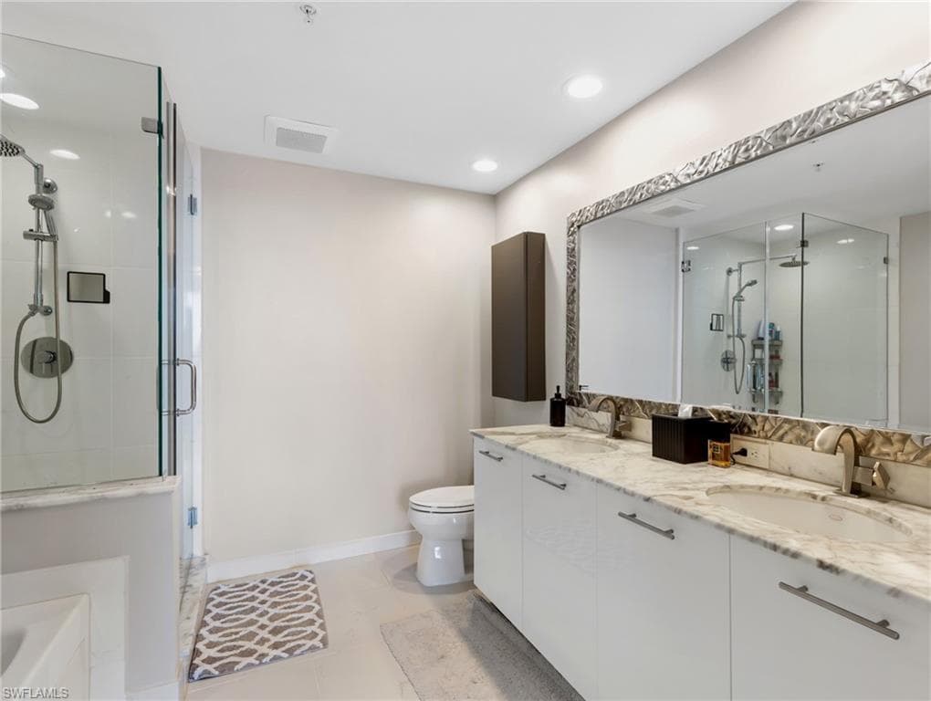 dual vanities, soaking tub, shower