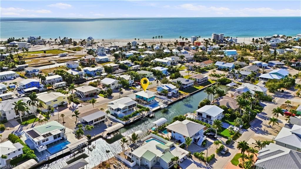 Aerial perspective of suburban area with the Gulf - Virtually Edited Image
