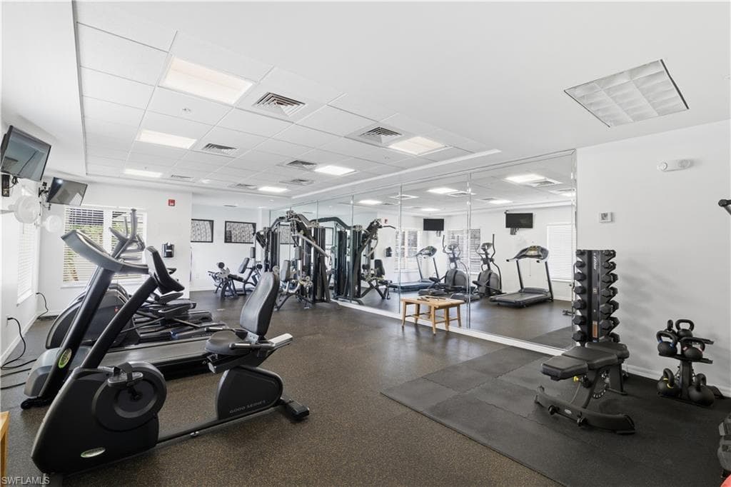 Gym featuring a drop ceiling