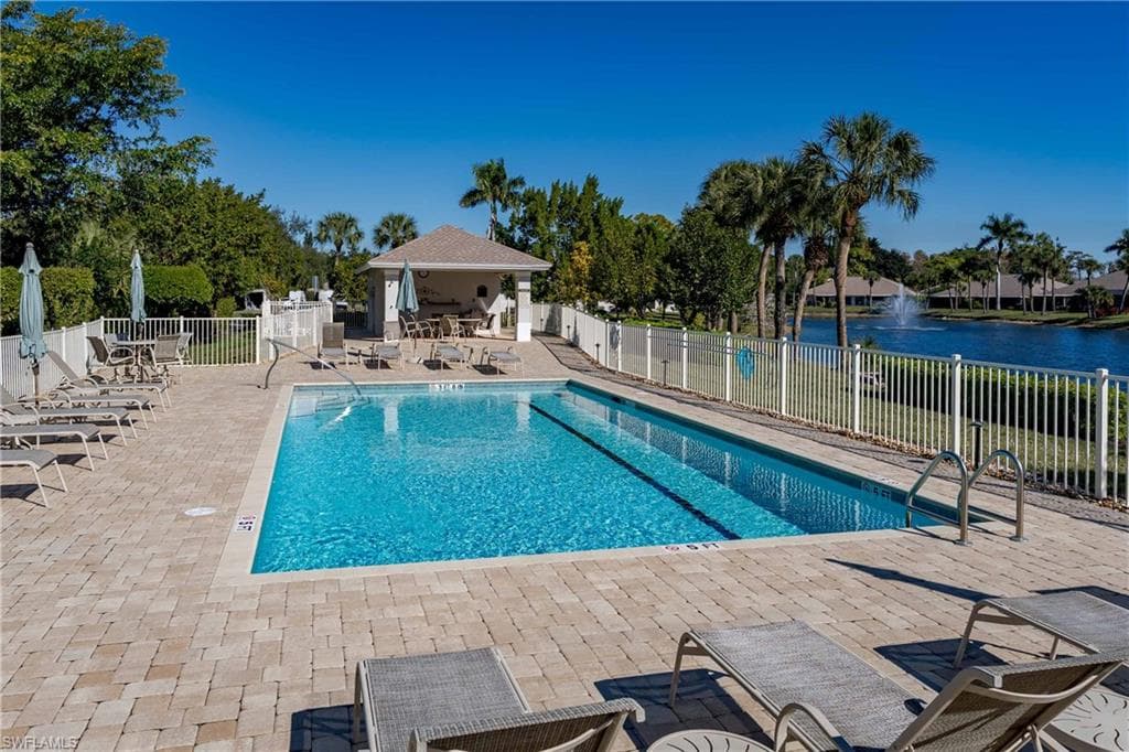 Community pool with a patio area
