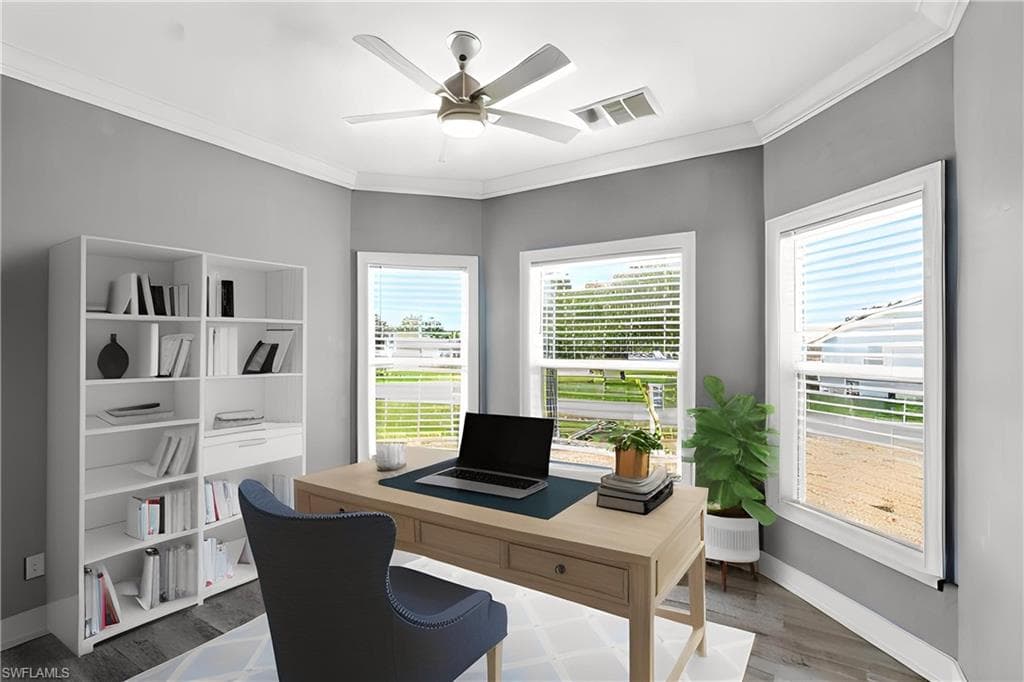 Front room with beautiful bay windows can be used as an office or a bedroom with a full closet.