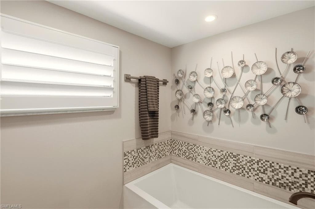 Bathroom featuring a bath