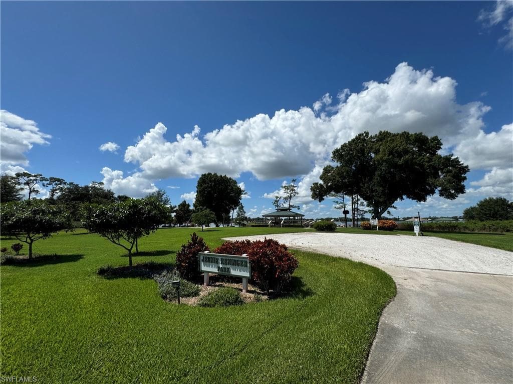 View of property's community featuring a yard and a gazebo