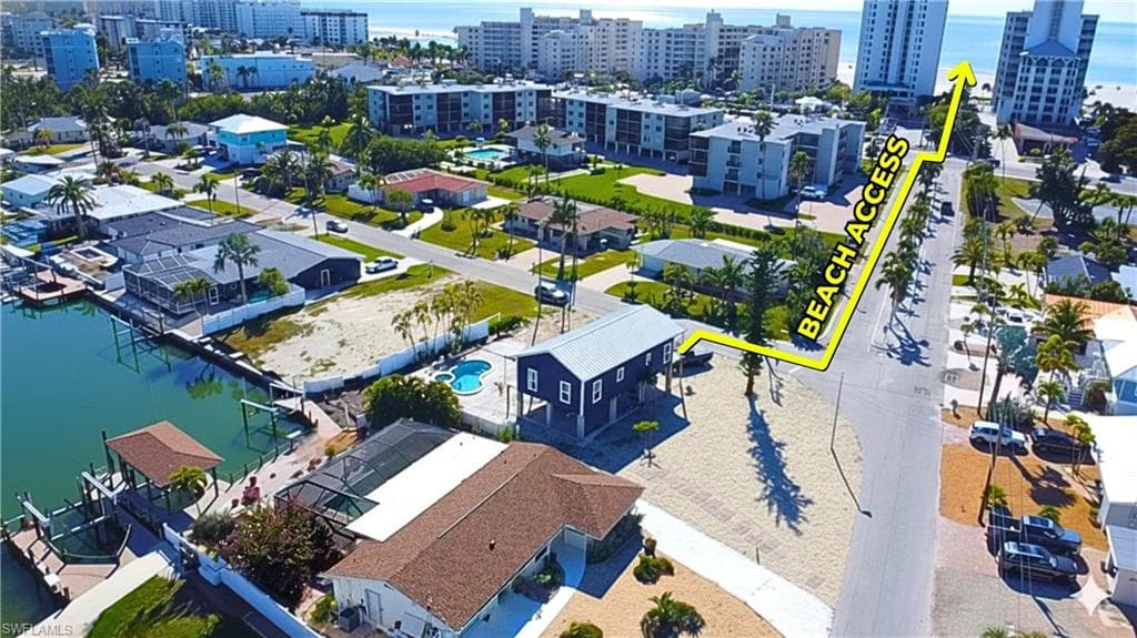 Aerial view with canal and the beach access .VIRTUALLY EDITED