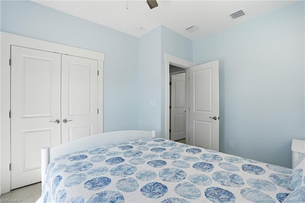 Interior room with light blue walls and white trim - Virtually Edited Image