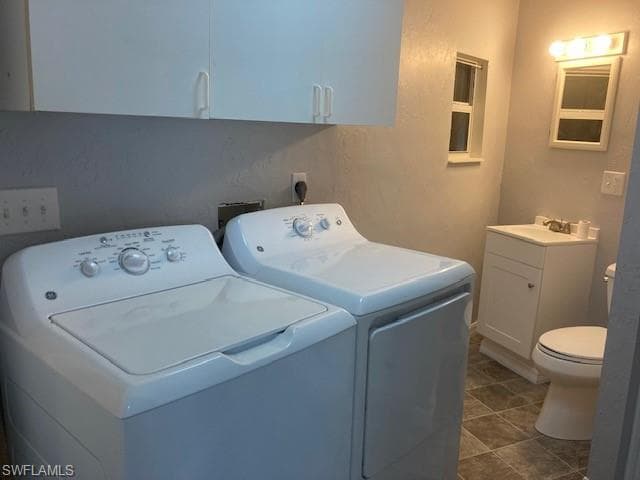 Laundry area washer and dryer with full bath room