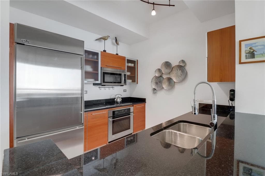 Kitchen area with modern cabinets