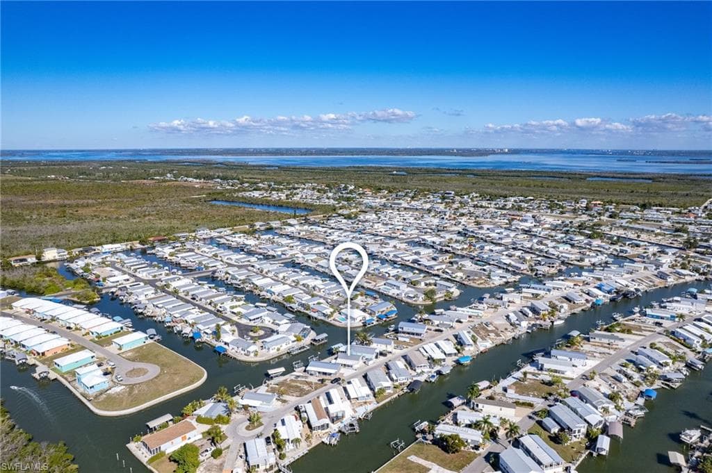 View of property location with a large body of water
