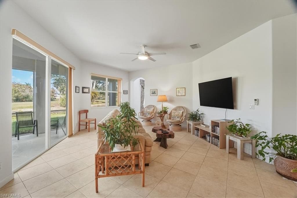 Sitting room with carpet and baseboards