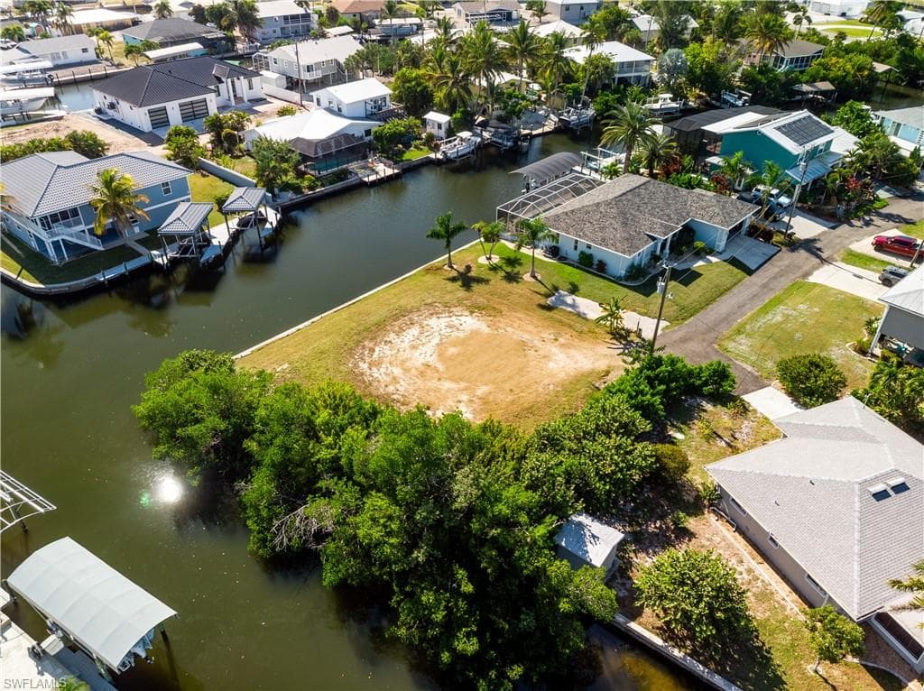 Aerial view of residential area with a nearby body of water