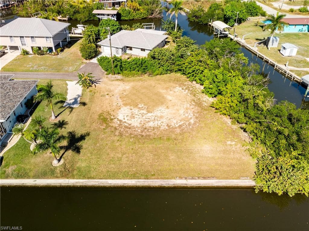 Aerial view of residential area with a nearby body of water
