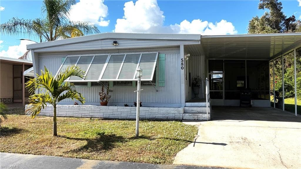 Meticulously maintained double-wide with 2 spacious Bedrooms and 2 remodeled FULL bathrooms with showers.