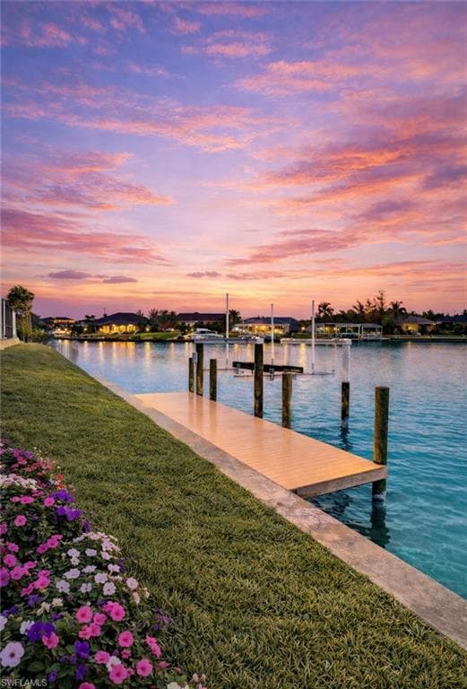 Dock with a yard and a water view (Rendered photo)