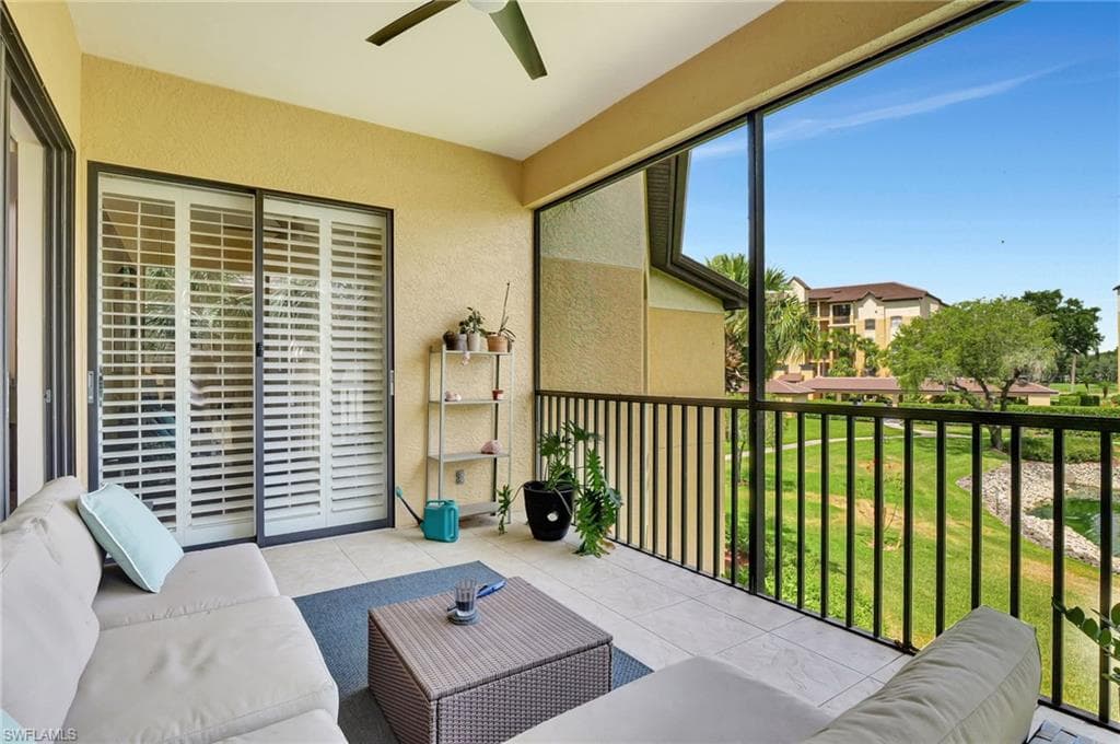 Sunroom with an outdoor hangout area and ceiling fan