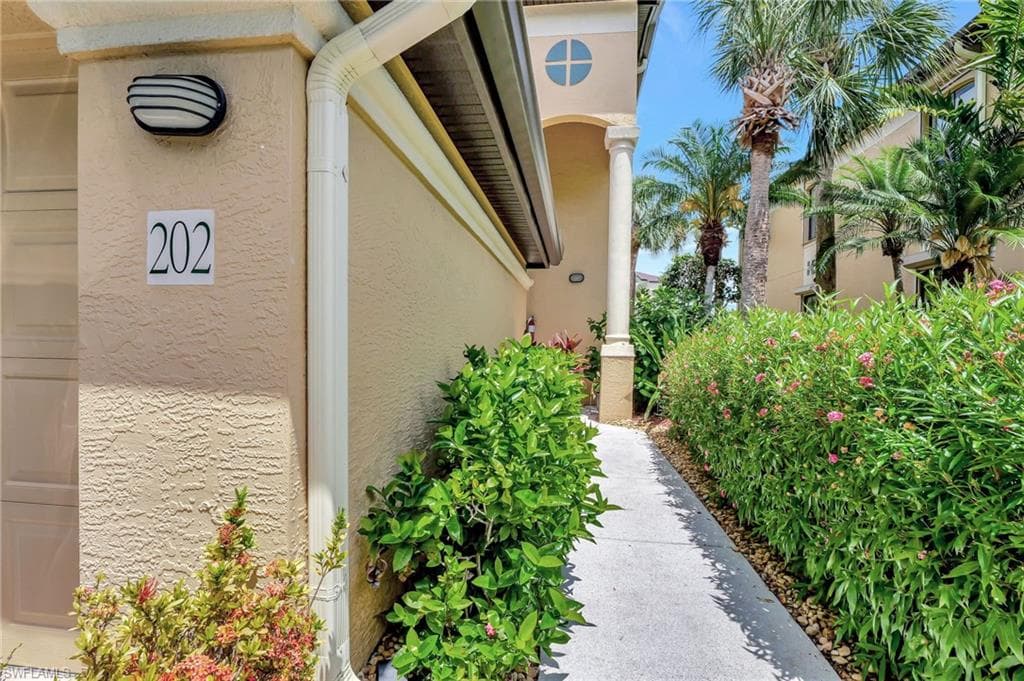 View of property exterior with stucco siding