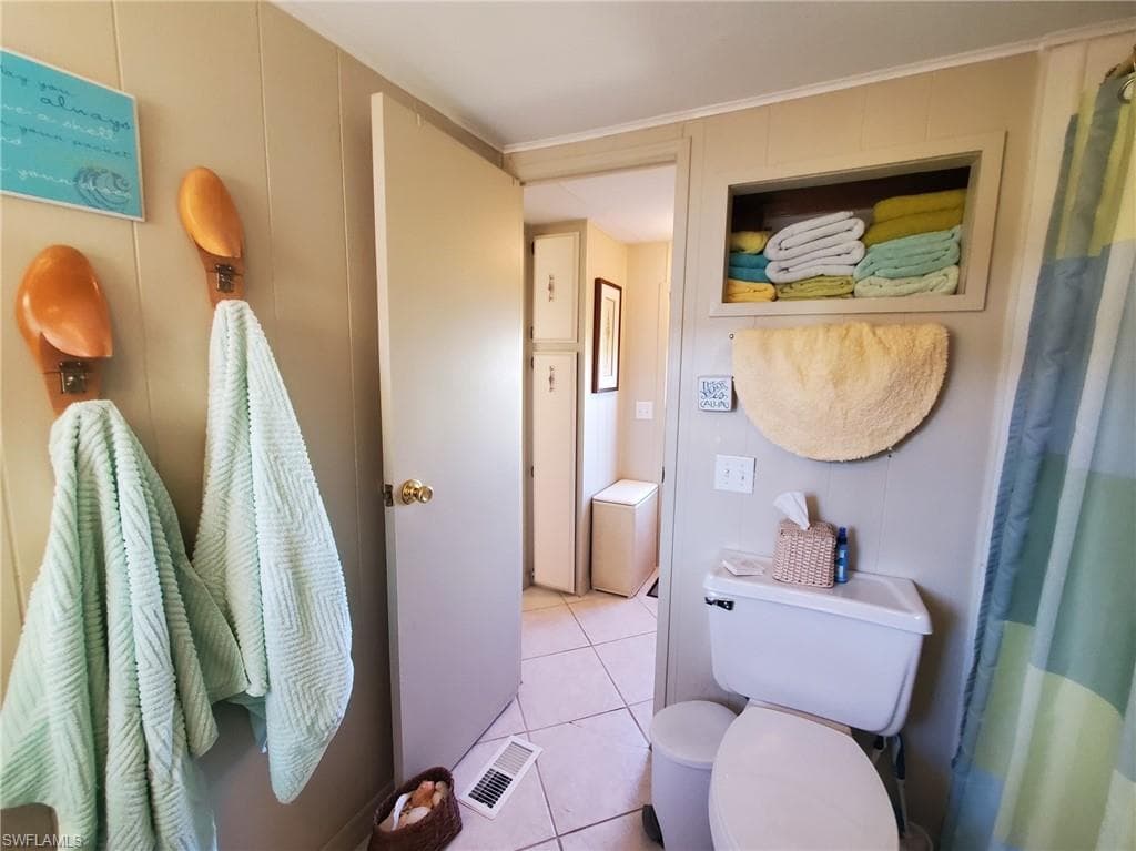 Main bathroom features a shower tub combination.