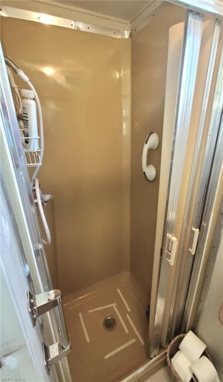 Shower adjacent to the second bedroom.