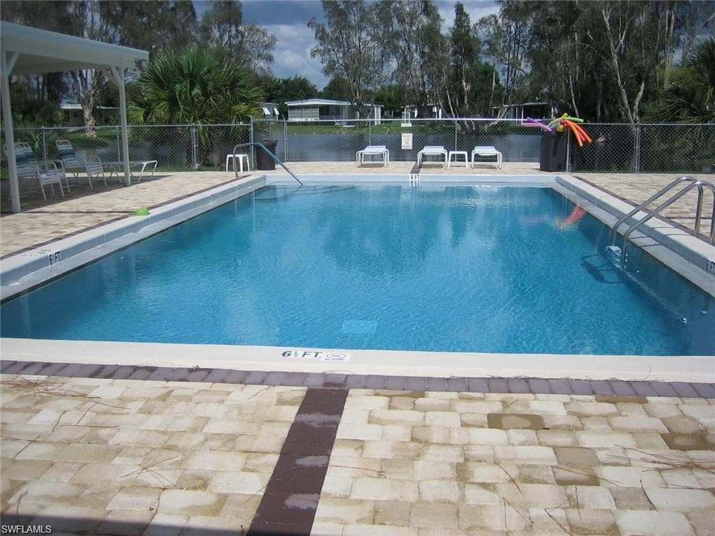 Kick back and enjoy the Florida lifestyle at the heated community pool.