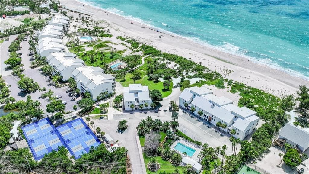 Bird's eye view of extended coastline and a pool