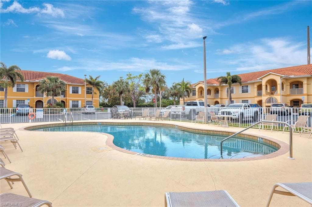 Community pool with a patio area