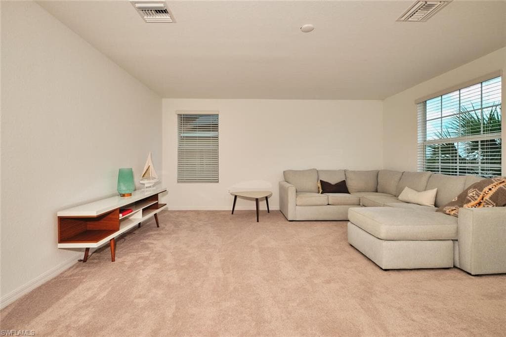 Carpeted loft/flex space w lightingith recessed