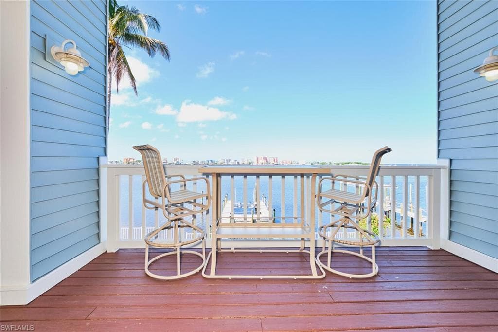 Main living area - Wooden deck with a water view