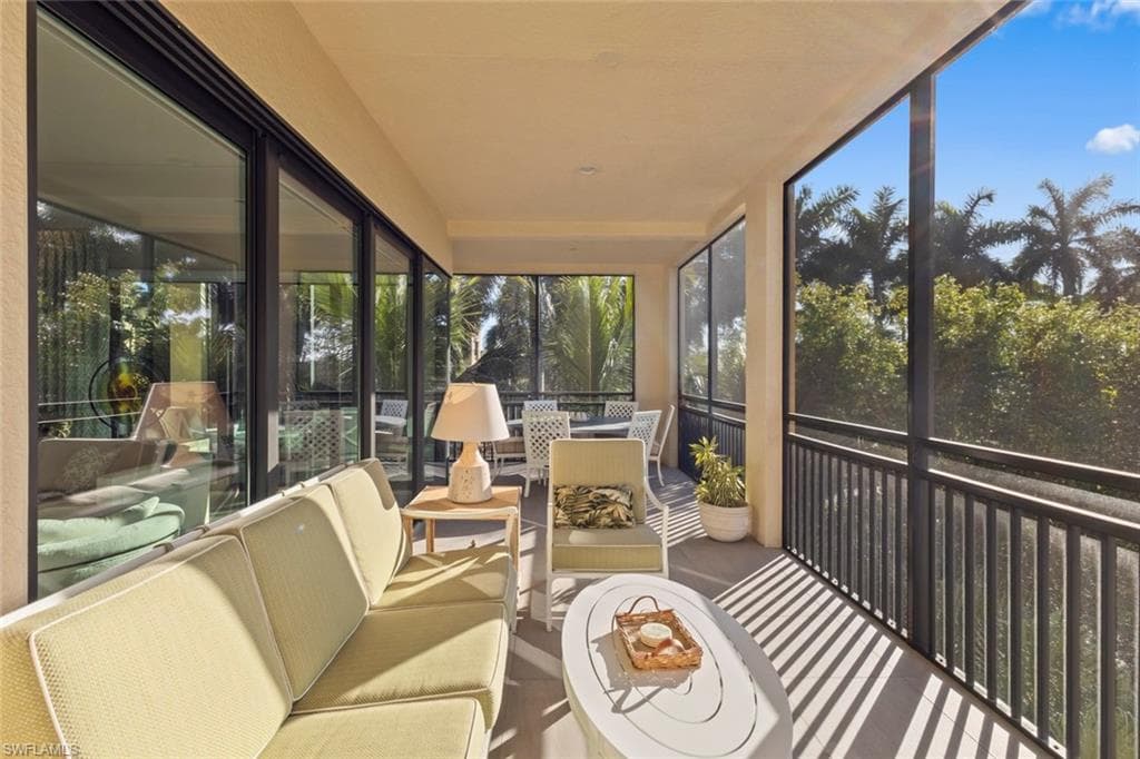 Sunroom with an outdoor hangout area