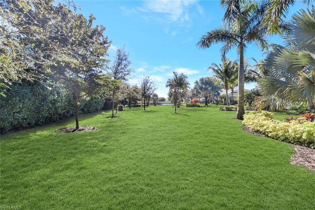 View of LARGE FLAT grassy yard