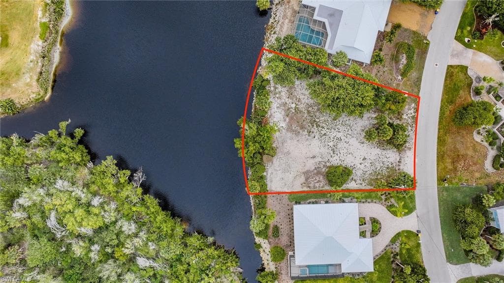 View of property location with a large body of water and property parcel outlined