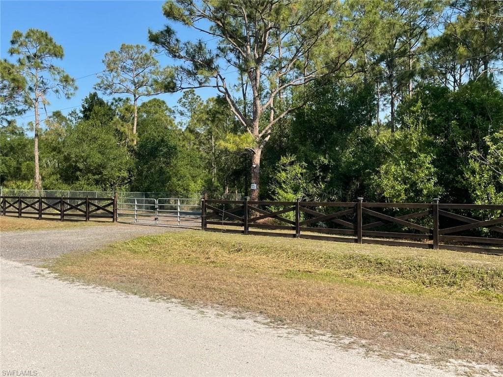 View of road featuring a gate