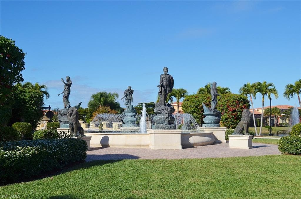 View of community with a lawn and a patio area