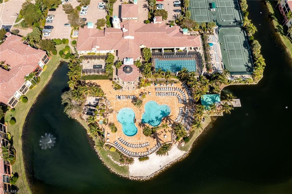 Aerial view of a large body of water and a pool area