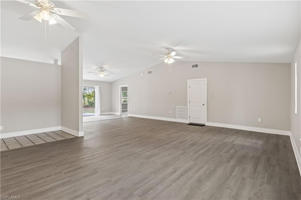 Natural light pours in, highlighting the open layout and relaxed island vibe.