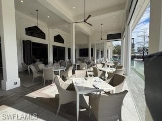 Deck featuring a patio area, ceiling fan, and outdoor dining area