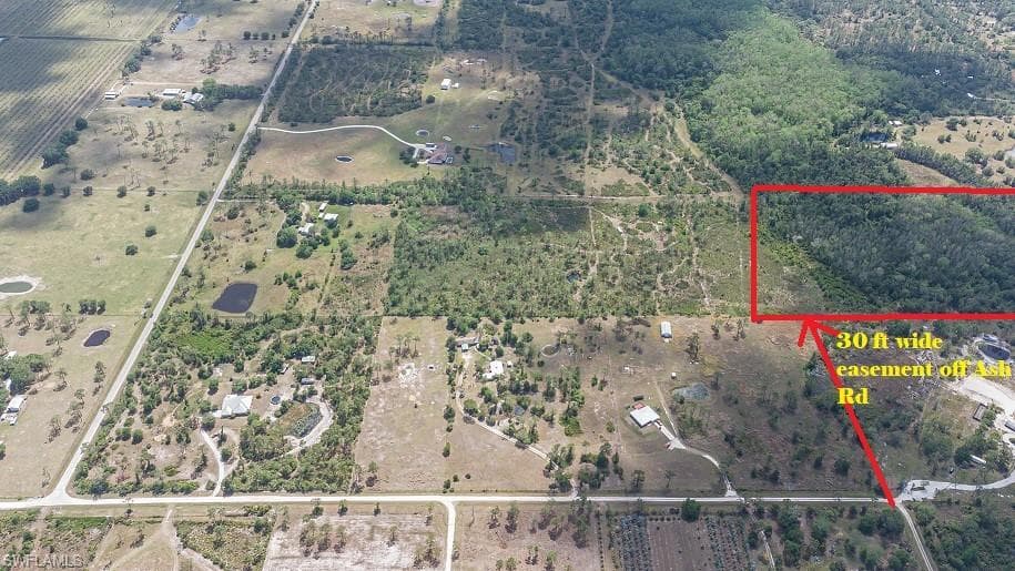 Aerial overview of property's location with property parcel outlined