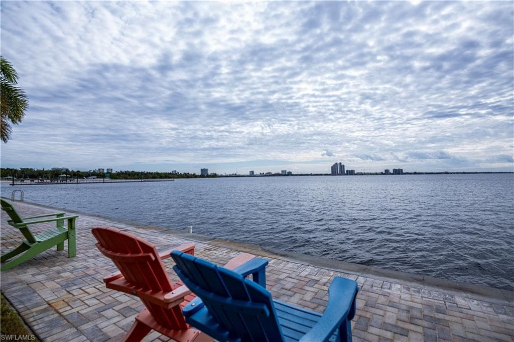 View of patio / terrace featuring a water view