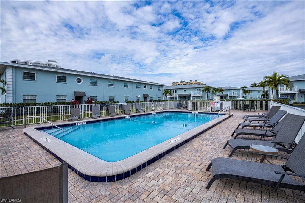 View of swimming pool with a patio
