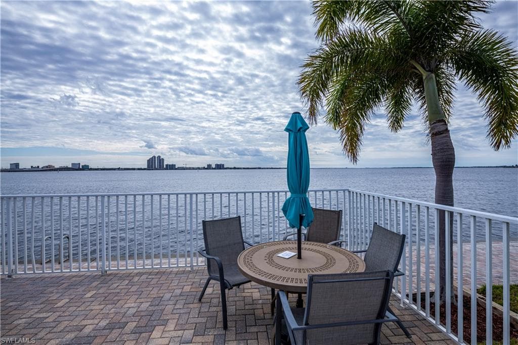 View of patio featuring a water view
