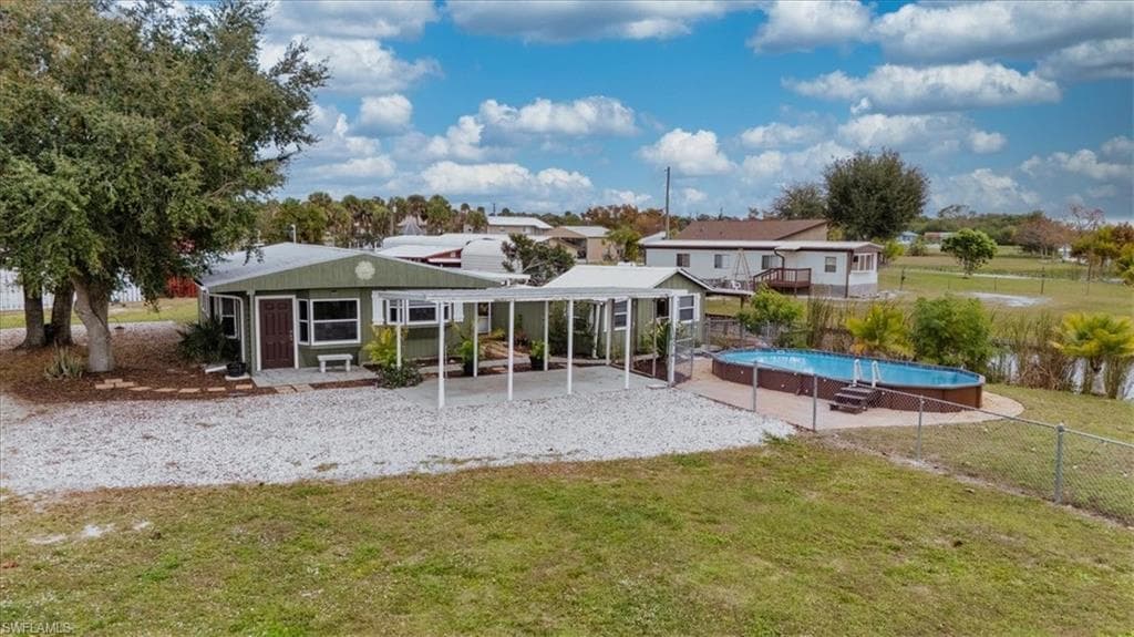 Parking, carport and pool area