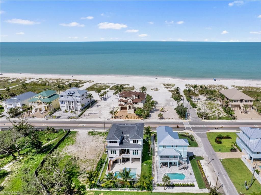 Aerial perspective of suburban area with extended coastline