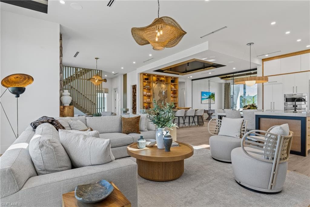 Building lobby featuring recessed lighting and stairs
