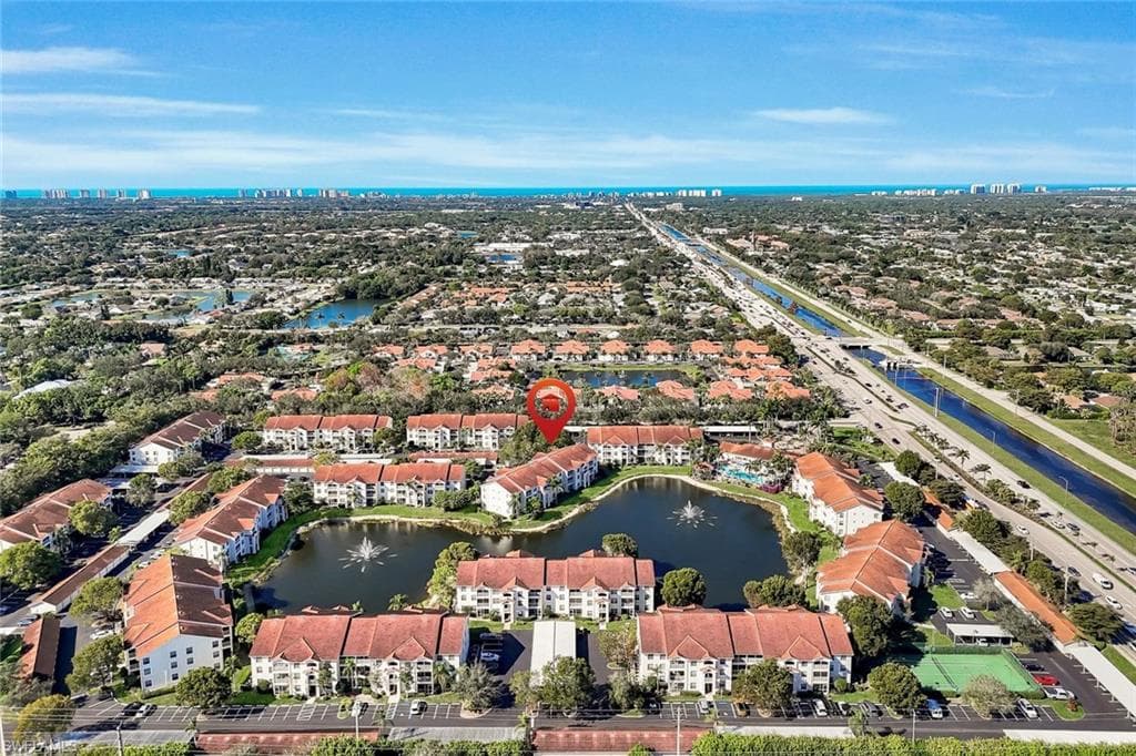 View of urban area featuring a nearby body of water