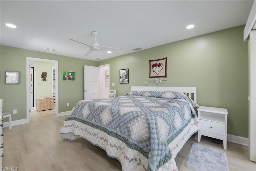 Bedroom with recessed lighting, light wood finished floors, and ceiling fan