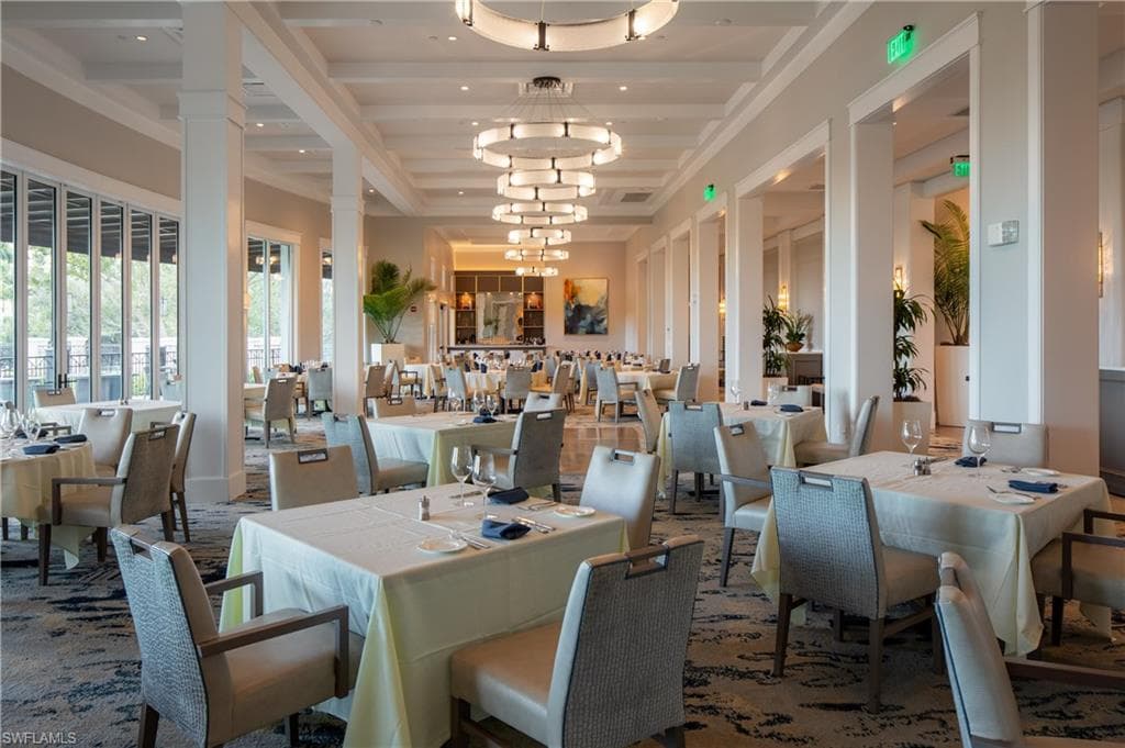 Dining area with beamed ceiling and a chandelier
