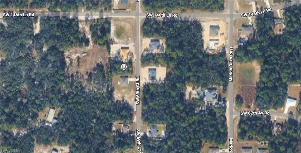 Aerial overview of property's location featuring property parcel outlined