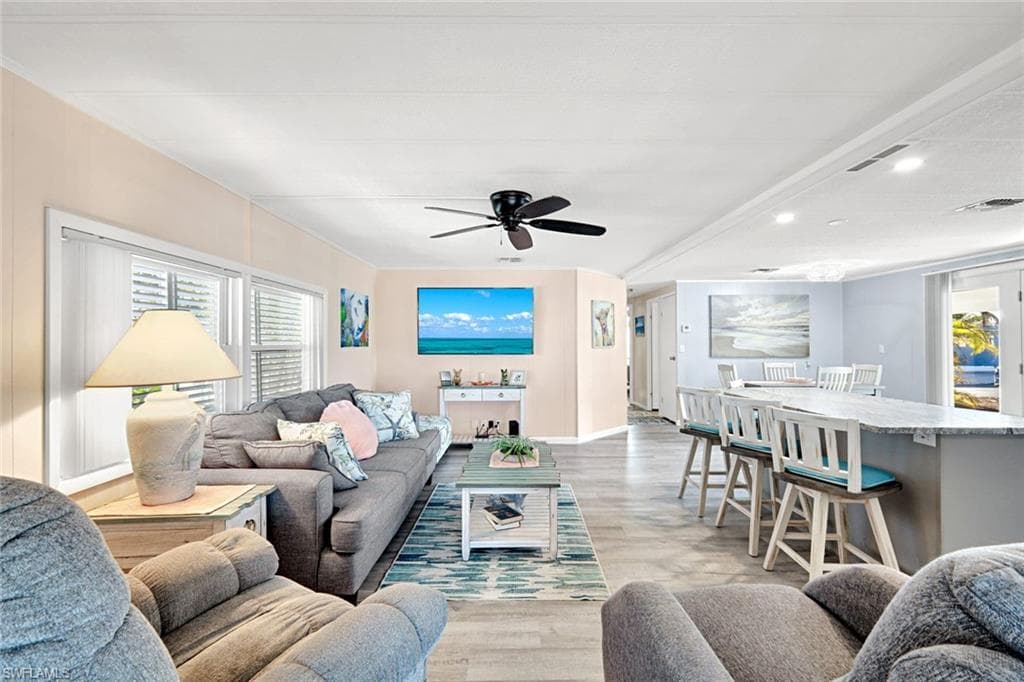 Spacious open-concept living area connecting the kitchen, dining, and family room for effortless entertaining.