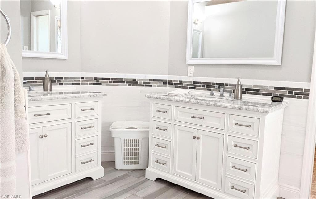 The Main Bedroom En-Suite Features Double Vanities and a Generous Amount of Space & Storage