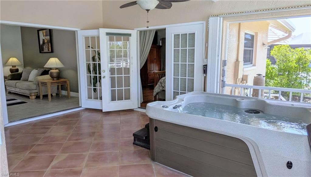 The Luxurious Heated & Jetted Spa is Privately Located Outside of the Main Bedroom Doors.
